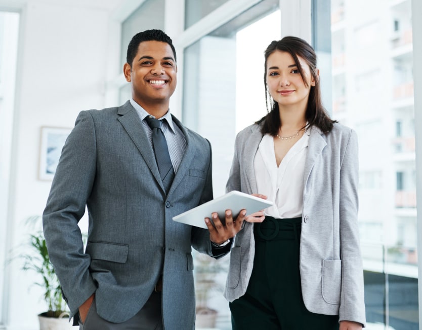 accounting and bookkeeping services | two professionals standing next to each other